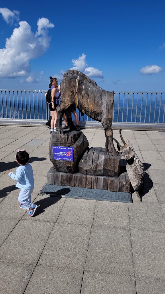  A mountain goat statue at the top 